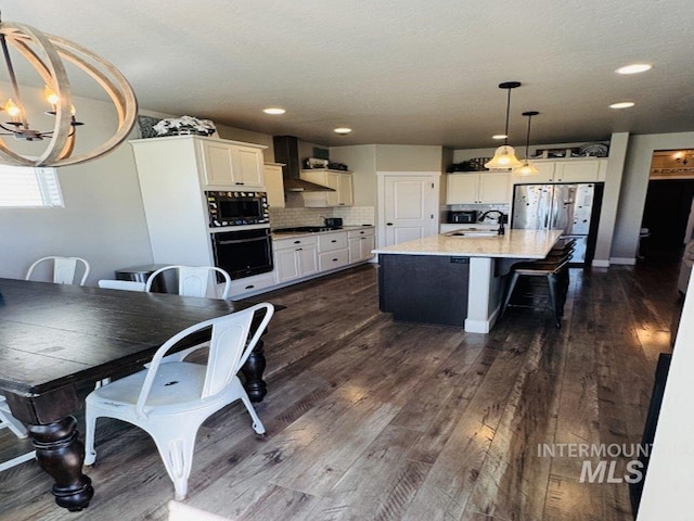 805 Drayton Ave, Twin Falls, ID 83301 - dining space with dark wood-style floors, a chandelier, and recessed lighting