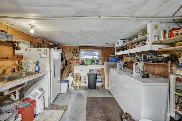 interior space featuring concrete flooring and sink