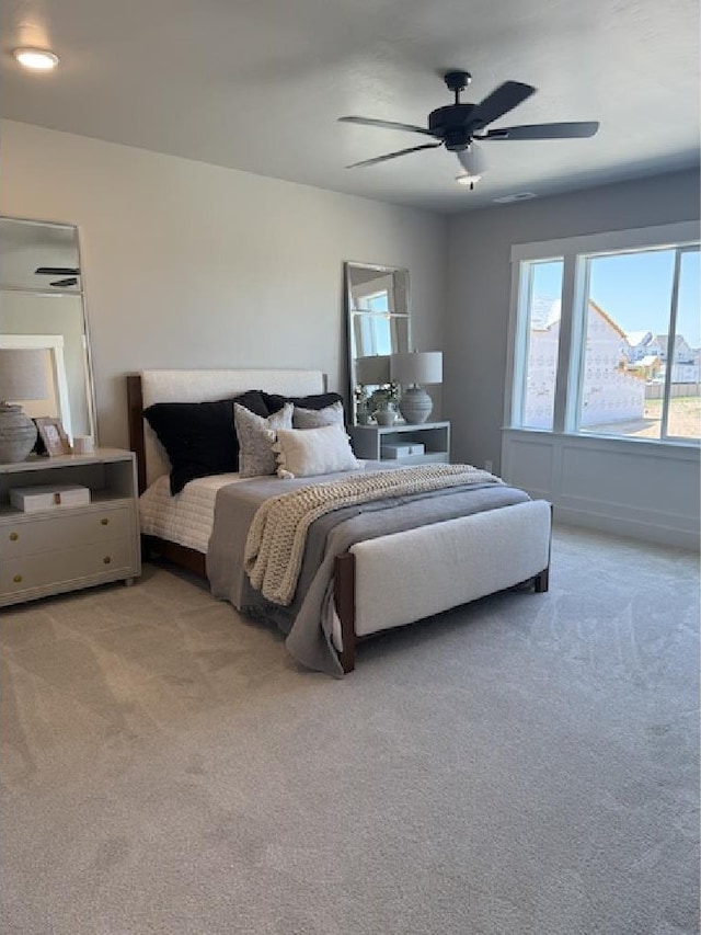4624 N Alameda Creek Ave, Meridian, ID 83646 - bedroom with light carpet and ceiling fan