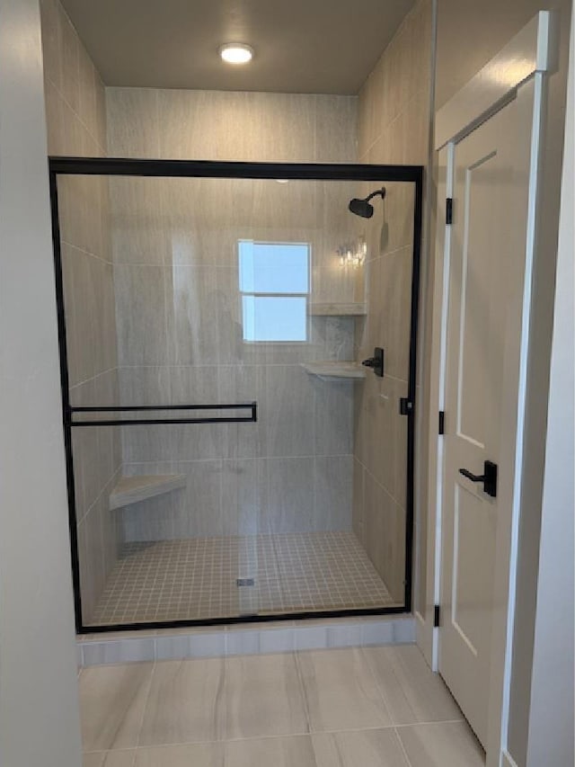 4624 N Alameda Creek Ave, Meridian, ID 83646 - full bathroom with a stall shower and tile patterned floors