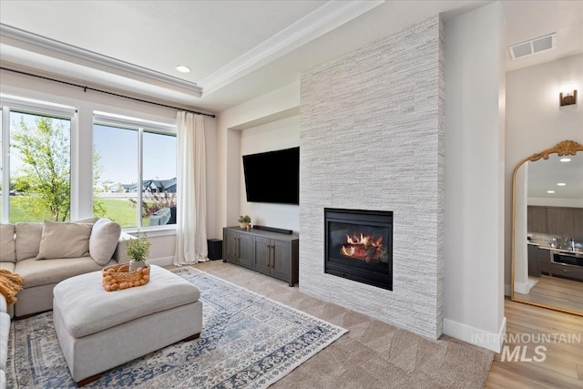18245 N Arch Haven Way, Nampa, ID 83687 - living room with a stone fireplace, baseboards, and recessed lighting