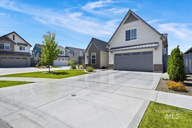 18245 N Arch Haven Way, Nampa, ID 83687 - view of front facade with brick siding, driveway, a garage, and a residential view