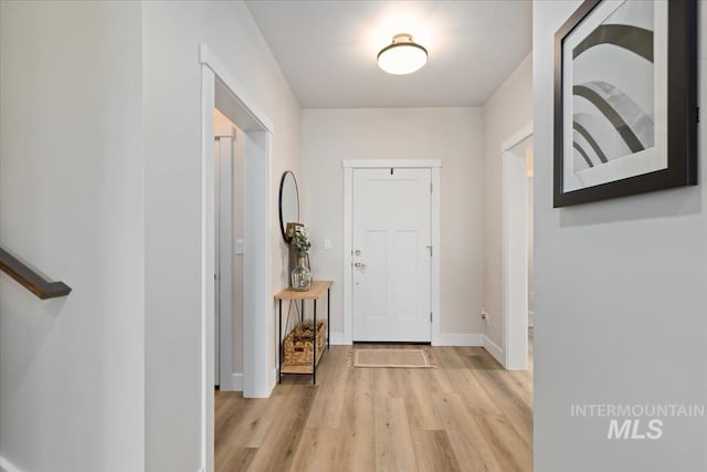 18245 N Arch Haven Way, Nampa, ID 83687 - entrance foyer with light wood-style floors and baseboards