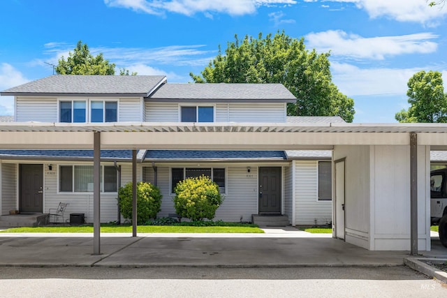 8305 W Rifleman St, Boise, ID 83704 - townhome / multi-family property with entry steps and covered parking
