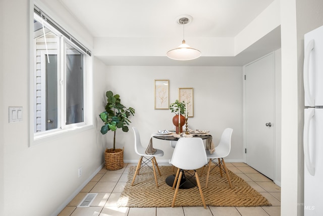 8305 W Rifleman St, Boise, ID 83704 - dining room with light tile patterned floors