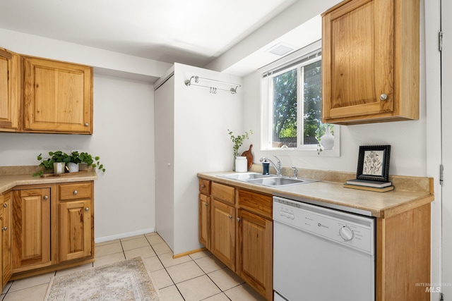 8305 W Rifleman St, Boise, ID 83704 - kitchen featuring white dishwasher, a sink, light countertops, and light tile patterned flooring