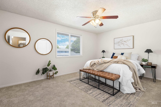 8305 W Rifleman St, Boise, ID 83704 - bedroom featuring carpet floors, a textured ceiling, baseboards, and ceiling fan