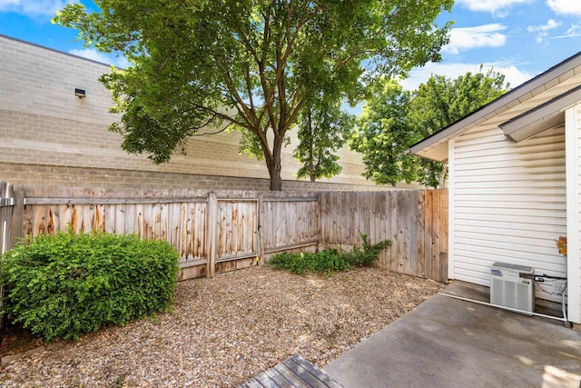 8305 W Rifleman St, Boise, ID 83704 - view of yard featuring central AC and a patio