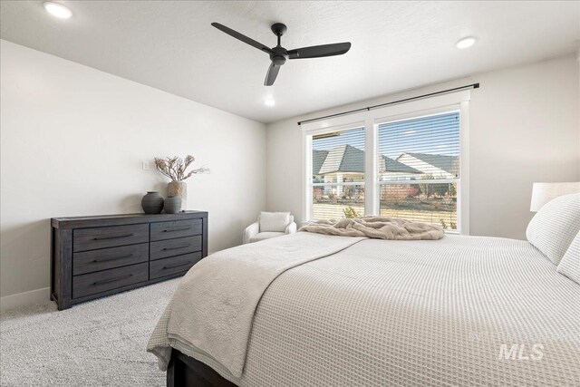 bedroom featuring a ceiling fan, recessed lighting, carpet flooring, and baseboards