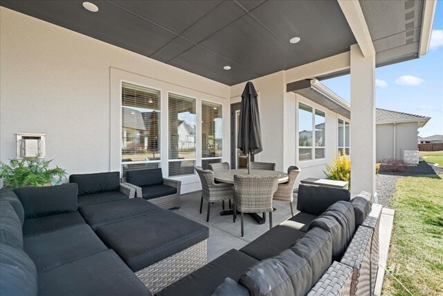 view of patio featuring an outdoor hangout area and outdoor dining area