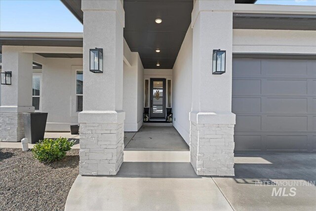 doorway to property with stucco siding