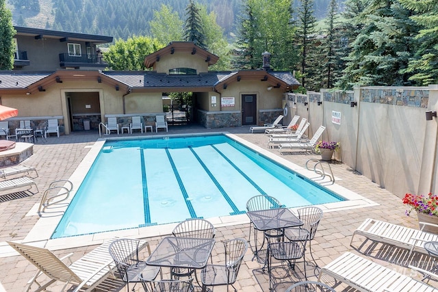 221 Picabo Street #D, Interest 1-H, Ketchum, ID 83340 - community pool featuring a patio area and outdoor dining space