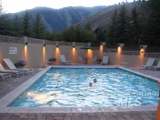 221 Picabo Street #D, Interest 1-H, Ketchum, ID 83340 - community pool featuring a mountain view and a patio