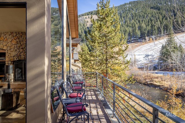 221 Picabo Street #D, Interest 1-H, Ketchum, ID 83340 - balcony featuring a forest view and a mountain view