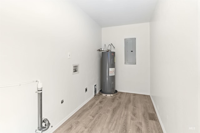 washroom with hookup for an electric dryer, water heater, electric panel, washer hookup, and laundry area