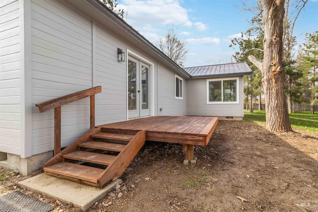 wooden terrace featuring french doors