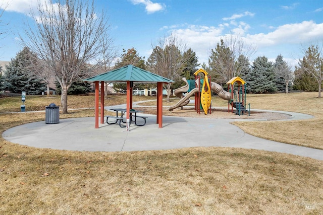 community playground featuring a gazebo and a lawn