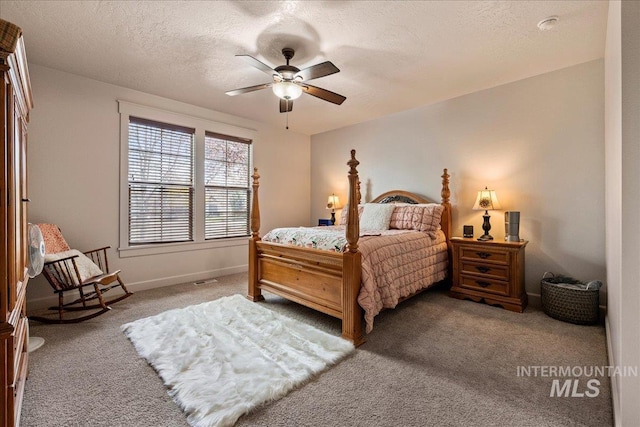 1063 Hitchcock St, Meridian, ID 83646 - bedroom with a textured ceiling, carpet flooring, baseboards, and ceiling fan
