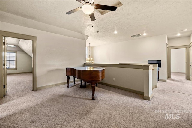 1063 Hitchcock St, Meridian, ID 83646 - rec room with a textured ceiling, light carpet, and ceiling fan