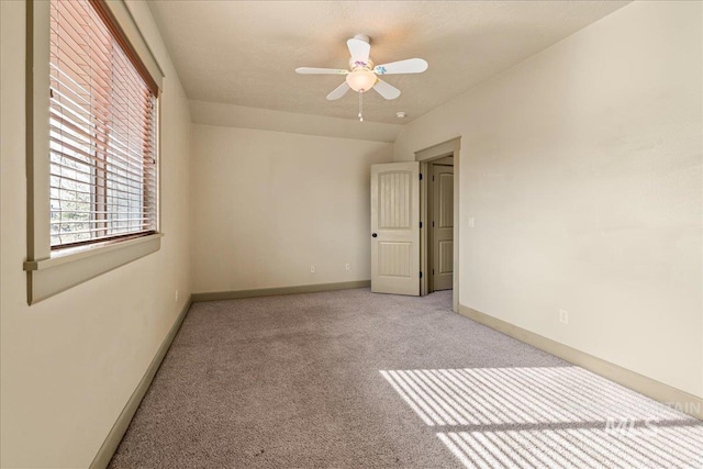 1063 Hitchcock St, Meridian, ID 83646 - unfurnished bedroom featuring a ceiling fan, baseboards, and carpet