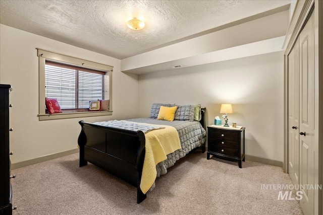 1063 Hitchcock St, Meridian, ID 83646 - bedroom with a closet, carpet, a textured ceiling, and baseboards