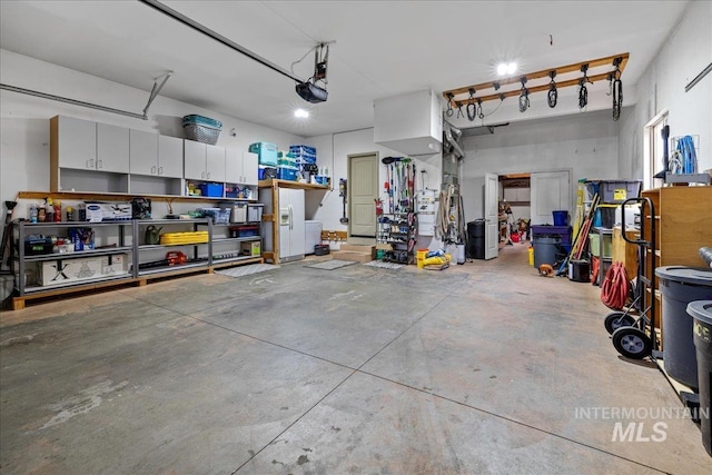 1063 Hitchcock St, Meridian, ID 83646 - garage featuring a garage door opener