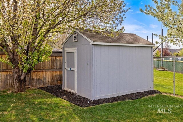 1063 Hitchcock St, Meridian, ID 83646 - view of shed with a fenced backyard