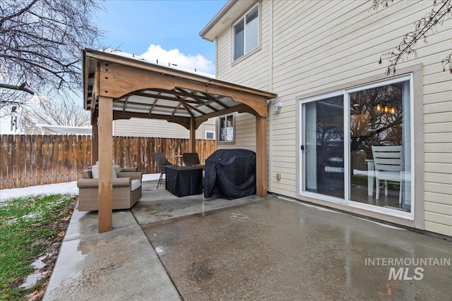 view of patio / terrace featuring a gazebo and grilling area