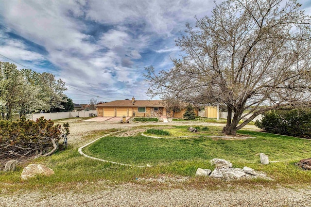 view of yard with a garage