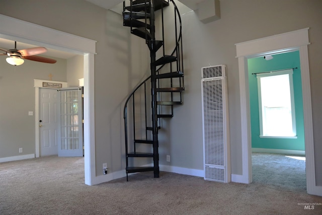 585 N 5th E, Mountain Home, ID 83647 - stairs with a heating unit, carpet floors, ceiling fan, and baseboards