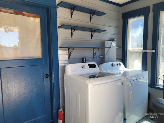 585 N 5th E, Mountain Home, ID 83647 - laundry area with washer and clothes dryer and healthy amount of natural light