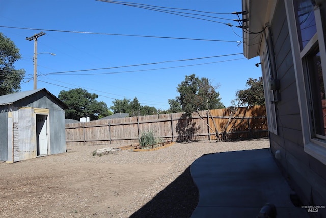 585 N 5th E, Mountain Home, ID 83647 - fenced backyard featuring a patio