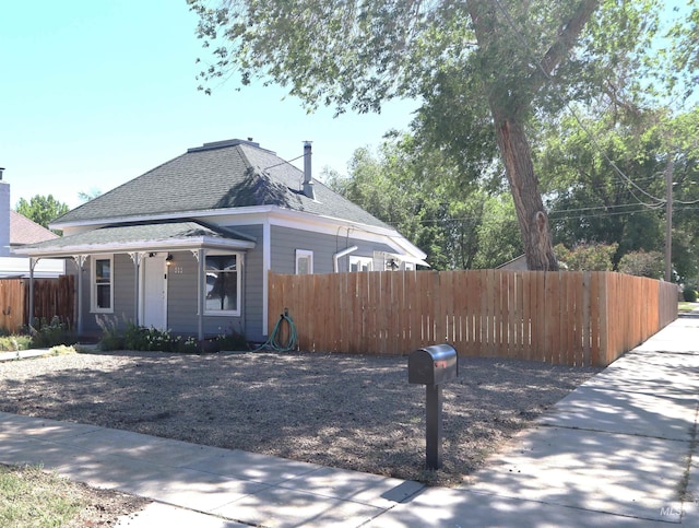 585 N 5th E, Mountain Home, ID 83647 - view of front of house featuring roof with shingles