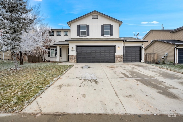 view of front property with a garage and a front lawn