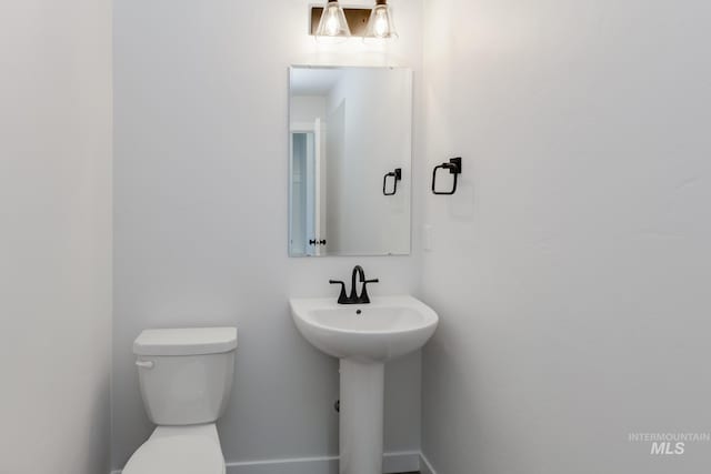 5813 W Stavros St, Meridian, ID 83646 - half bath featuring toilet and a sink