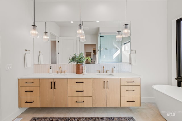 bathroom with vanity, backsplash, tile patterned flooring, and separate shower and tub