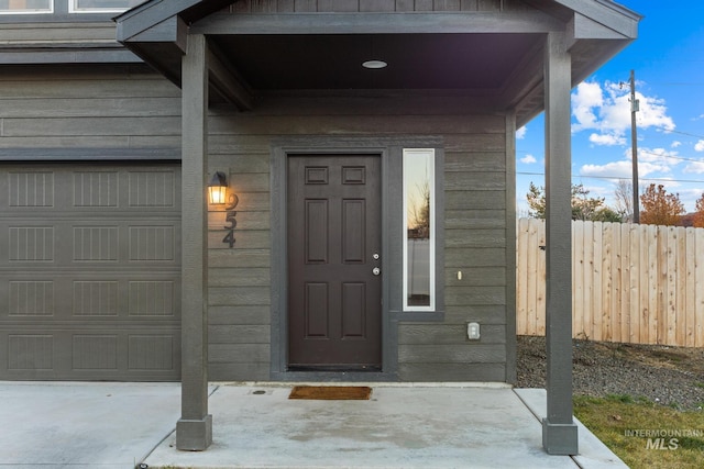 property entrance featuring a garage