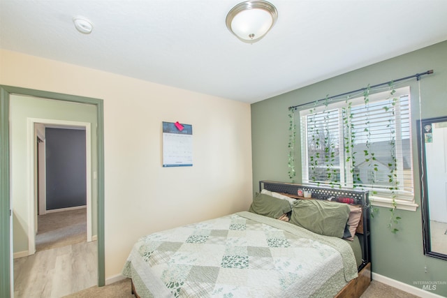 bedroom with baseboards