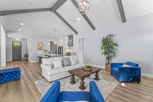 5001 S Twilight Mist Way, Meridian, ID 83642 - living area with light wood-style floors, recessed lighting, and a chandelier