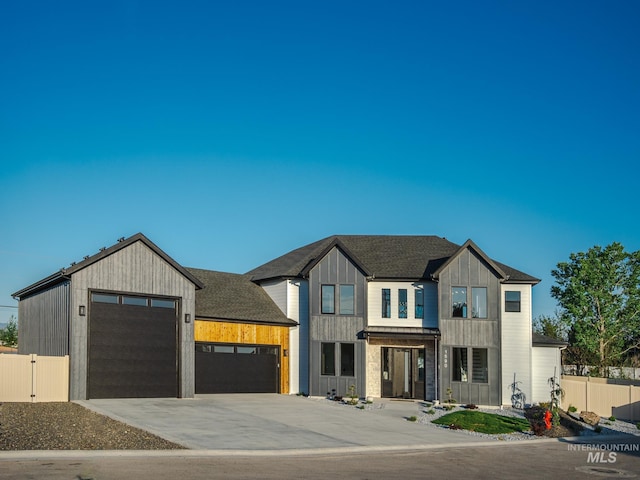 1590 N Watershed Ln, Star, ID 83669 - modern inspired farmhouse with fence, a garage, concrete driveway, and a gate