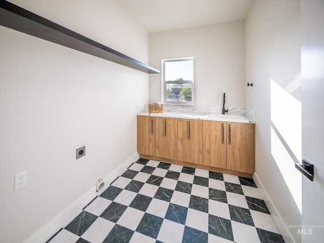1590 N Watershed Ln, Star, ID 83669 - washroom featuring cabinet space, electric dryer hookup, and baseboards
