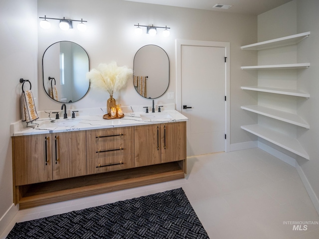 1590 N Watershed Ln, Star, ID 83669 - bathroom with double vanity and tile patterned flooring