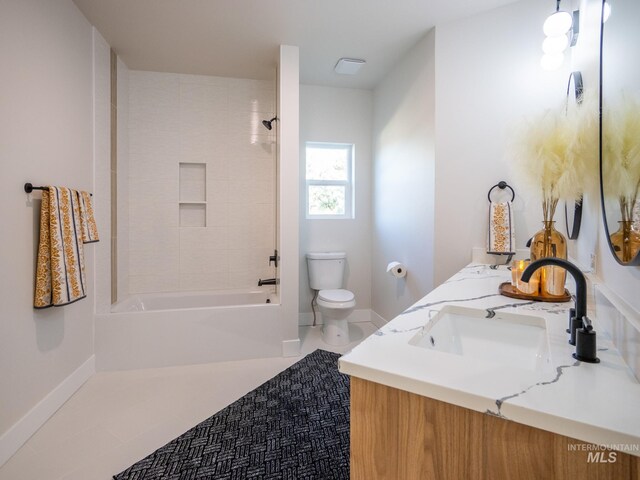 1590 N Watershed Ln, Star, ID 83669 - bathroom featuring toilet, shower / bath combination, double vanity, tile patterned flooring, and baseboards