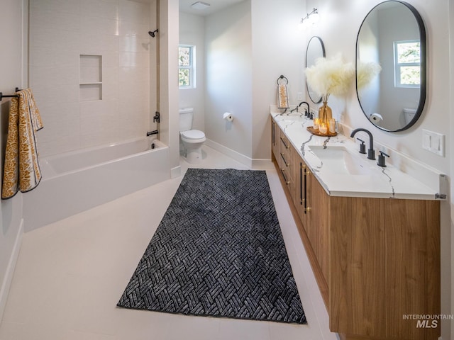 1590 N Watershed Ln, Star, ID 83669 - full bathroom with toilet, plenty of natural light, double vanity, and baseboards