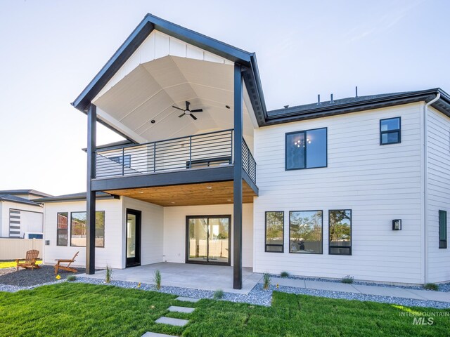 1590 N Watershed Ln, Star, ID 83669 - back of house with a balcony, a patio, a lawn, and a ceiling fan