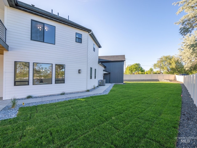 1590 N Watershed Ln, Star, ID 83669 - rear view of property with central air condition unit