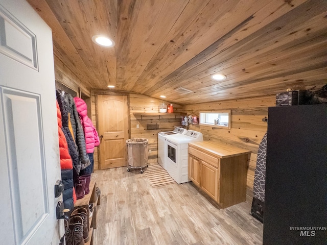 2263 Kilborn Ln, Mesa, ID 83632 - laundry room featuring wooden ceiling, light wood-type flooring, wood walls, washer and dryer, and cabinet space