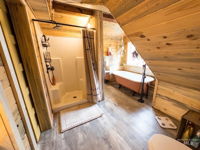 2263 Kilborn Ln, Mesa, ID 83632 - bathroom with wood walls, a shower stall, wood finished floors, a freestanding tub, and toilet