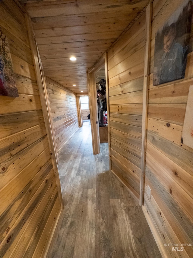 2263 Kilborn Ln, Mesa, ID 83632 - corridor with wood walls, wooden ceiling, and wood finished floors