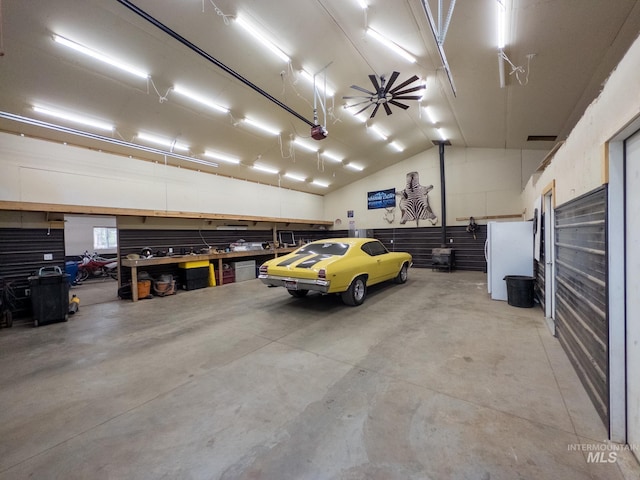 2263 Kilborn Ln, Mesa, ID 83632 - garage with freestanding refrigerator and a garage door opener
